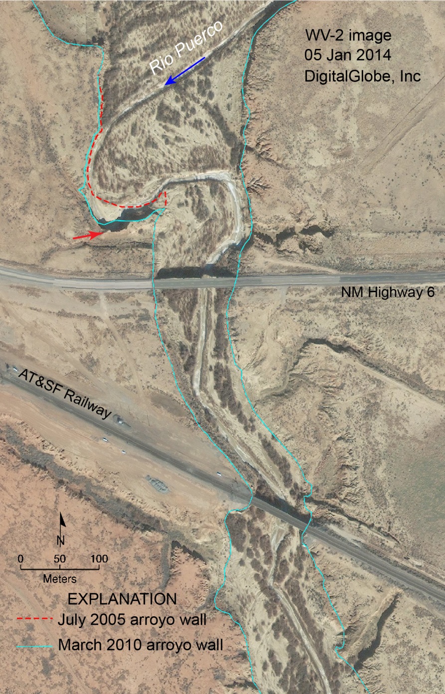 Rio Puerco arroyo wall locations mapped from 2005 imagery (red dashed line) and a 2010 lidar DTM (light blue line) overlaid on a WorldView-2 image acquired shortly after the September 2013 flood, on January 5, 2014 (DigitalGlobe, Inc.). The New Mexico Highway 6 crossing was the downstream limit of the sprayed reach. The northern limit of the untreated reach used for comparison of flood effects is the AT&SF Railway bridge. The red arrow points to a location where valley-fill sediment in the 10.6-m-high arroyo wall eroded another 13 m south toward the highway between March 2010 and January 2014.
