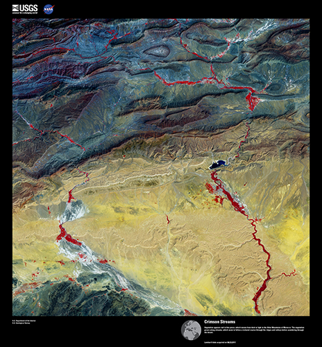 Vegetation appears red in this piece, which moves from dark to light in the Atlas Mountains of Morocco.