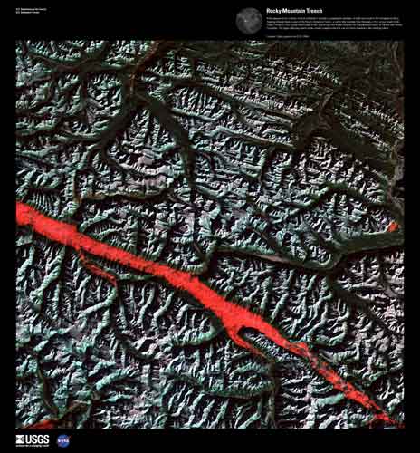 Red  line flows through black and white mountainous terrain.